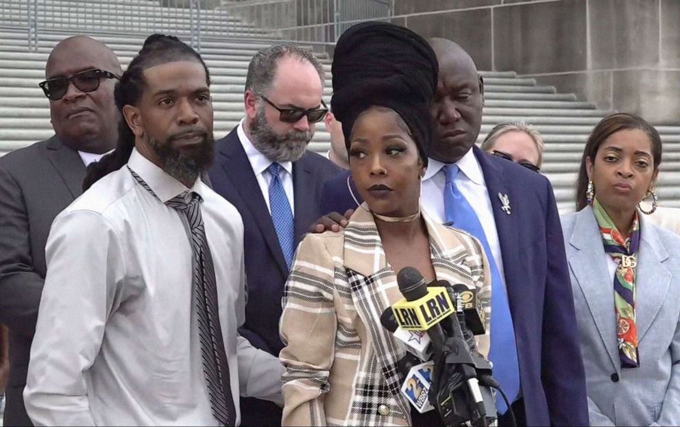 Nancy Davis stands next to attorney Ben Crump during a press conference in Batton Rouge, La., on Aug. 26, 2022. Ms. Davis was denied an abortion even though her fetus has been diagnosed with a fatal condition.